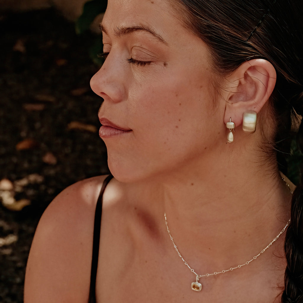 Handmade pair of sterling silver earrings with square and teardrop shapes by em jono 