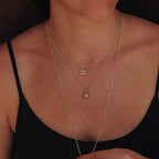 Handmade sterling silver citrine pendant on bar chain along with 10k gold spinner pendant by em jono 