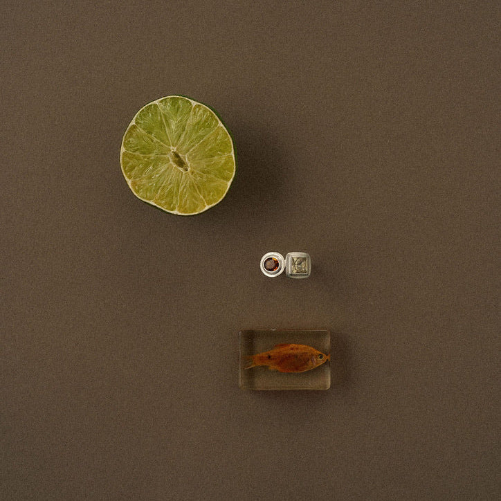  one of a kind handmade sterling silver statement ring with light princess cut citrine as well as a dark oval citrine by em jono 