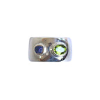 Handmade sterling silver cigar band with lapis carved face and peridot by em jono
