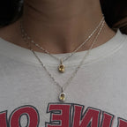 rhys charm | vertical | gold