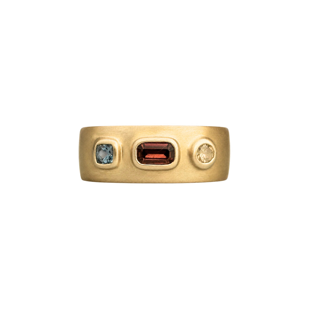 Handmade one of a kind 14k gold cigar band ring with natural blue/red sapphires and brown diamond by em jono
