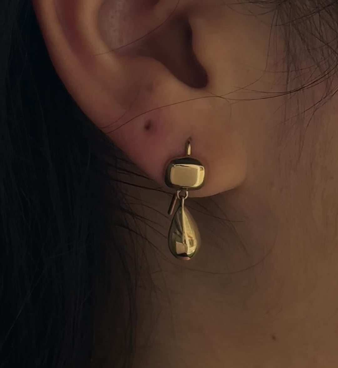 Handmade pair of sterling silver drop earrings with square and teardrop shapes by em jono 