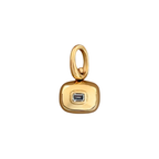two sided 10k gold spinner pendant with a natural blue sapphire and handmade by em jono 