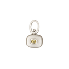 Handmade two sided sterling silver spinner pendant with a natural yellow sapphire by em jono 
