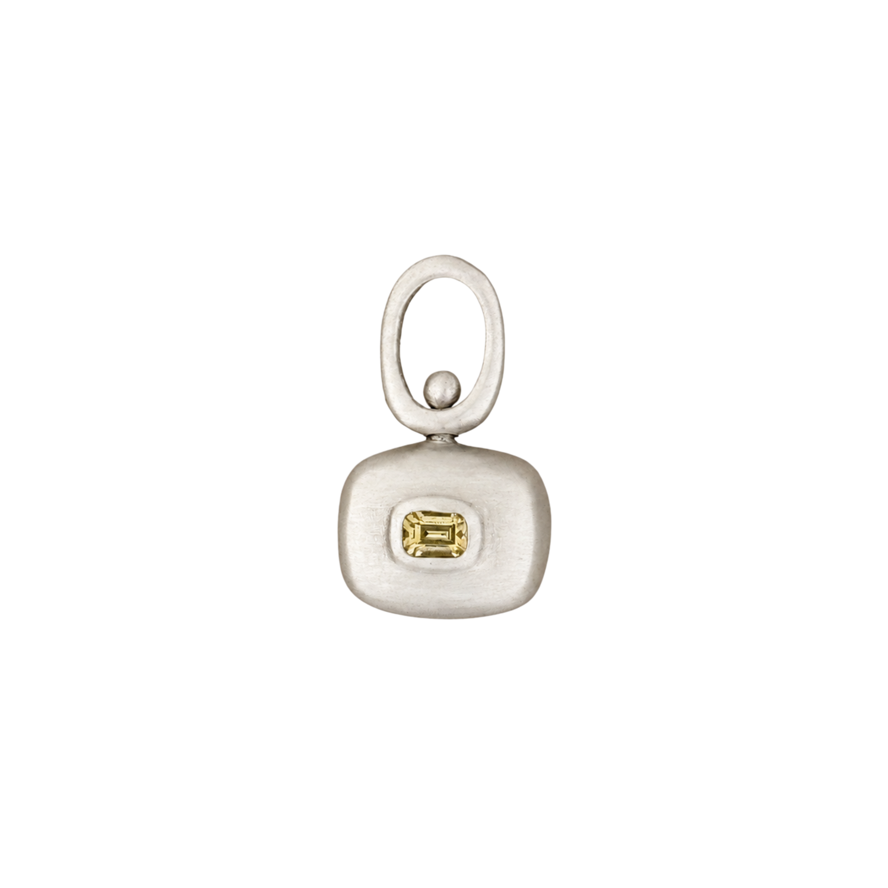 Handmade two sided sterling silver spinner pendant with a natural yellow sapphire by em jono 